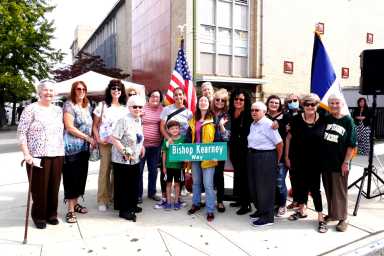 students and staff at the bishop kearney way street renaming