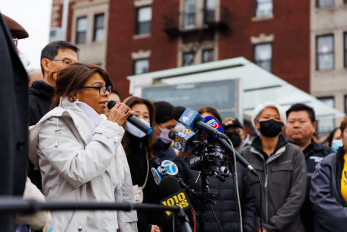 woman speaking at vigil in sunset park