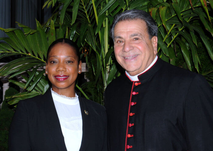 monsignor david cassato with keechant sewell