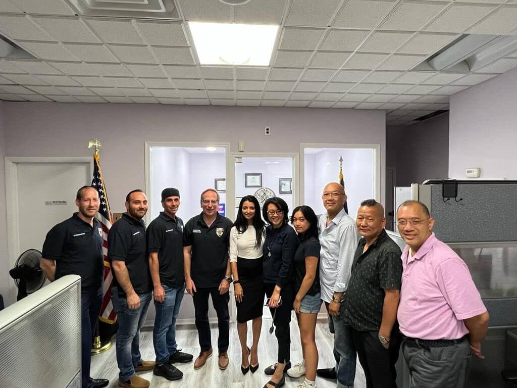 inna vernikov with asian community watch group volunteers