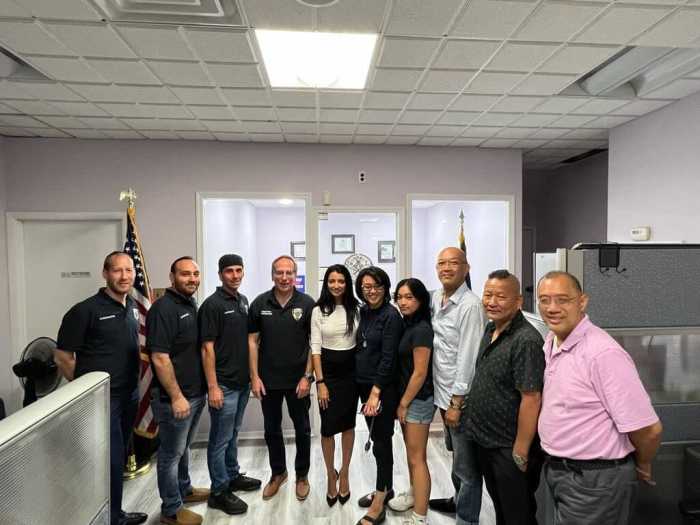 inna vernikov with asian community watch group volunteers