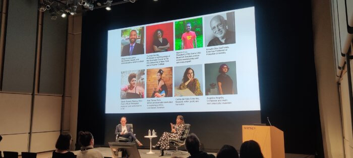 maria guerrero speaks at panel at hurricane maria exhibit at the witney