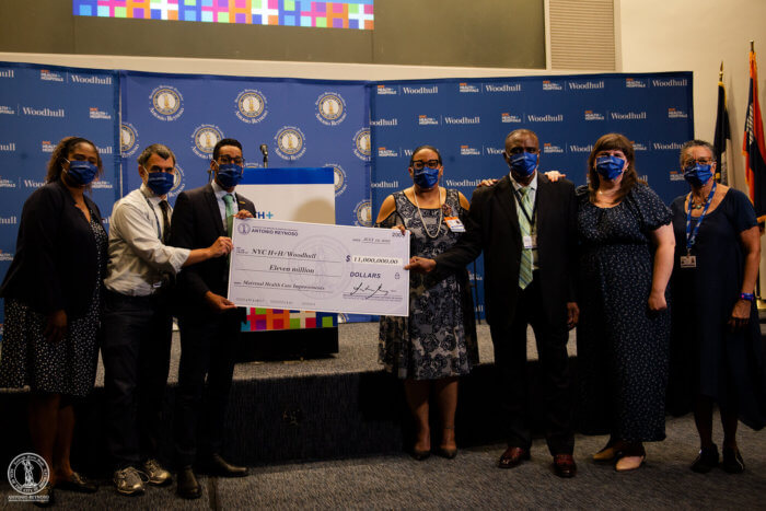 reynoso with big check