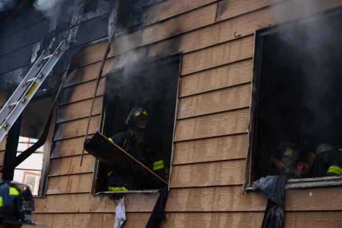 firefighters inside house