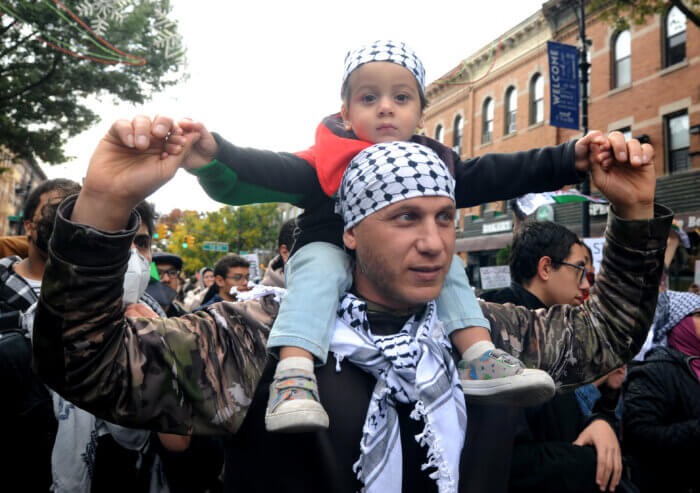 Father and son at Palestine rally