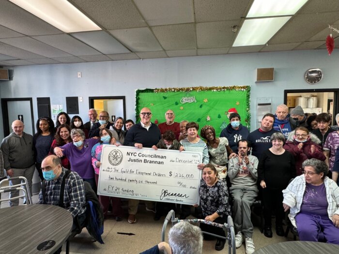 Smiling faces celebrate with Brannan at their Bay Ridge center.