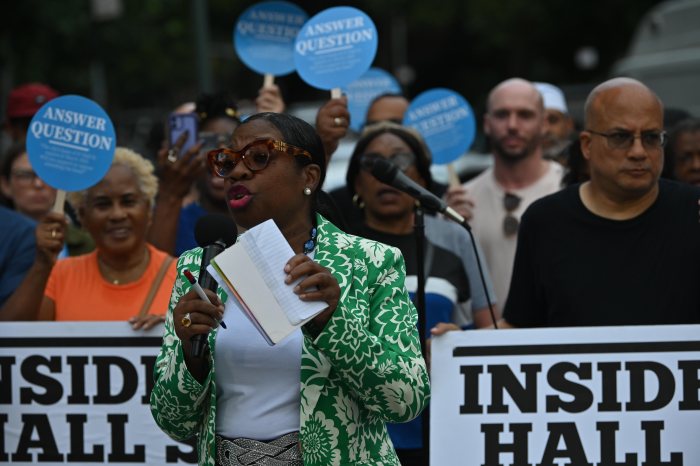 woman speaking at clinton hill shelter protest