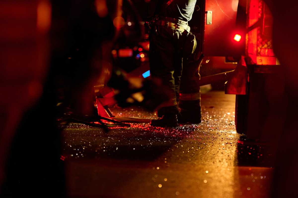 Debris and glass lay in the street following an explosion.
