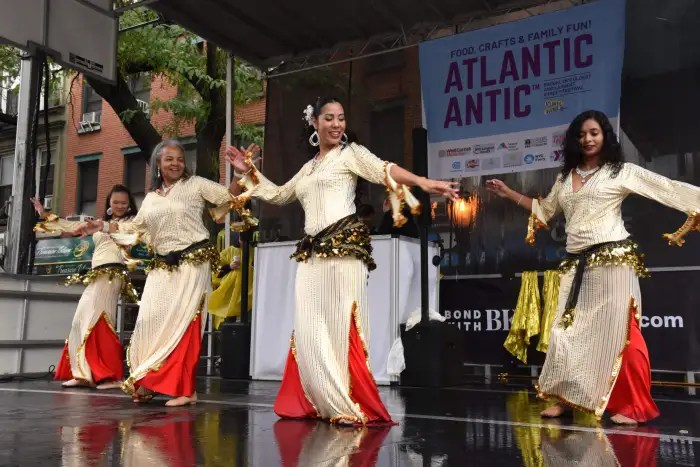 Atlantic Antic - the only time you’ll find a bouncy house and a belly dancer on the same block.