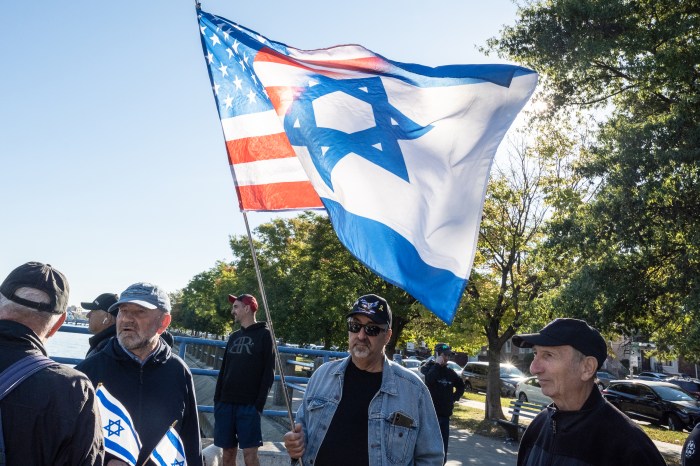 person with israeli/american flag