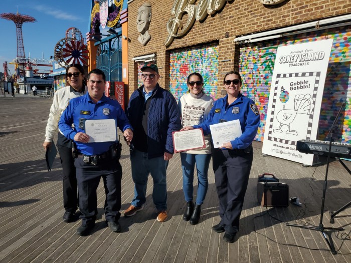 It takes all hands! Over 5 businesses partnered with local officials to pass out 500 turkeys.