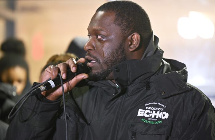 man speaking at east flatbush shooting vigil