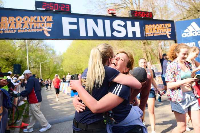 runners at finish of NYCRuns Brooklyn Half Marathon