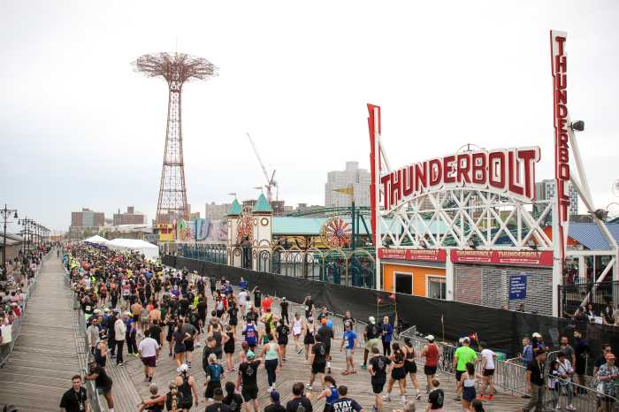 runners on boardwalk at rbc brooklyn half marathon