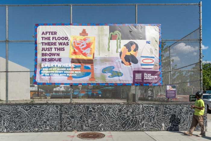 mural hanging on fence in gowanus